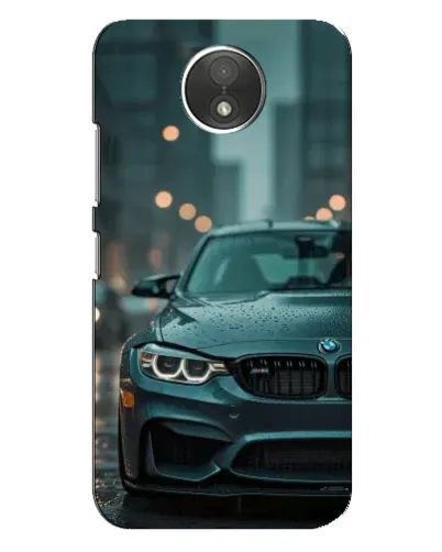 Чехол для Motorola Moto C (XT1750) с картинкой «BMW в огнях города»