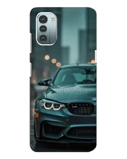 Чохол для Nokia G21 з картинкою «BMW у вогнях міста»