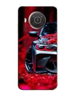 Чехол для Nokia X20 с картинкой «Спортивная BMW и цветы»