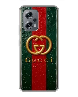 Чехол для Xiaomi POCO X4 GT с картинкой «Gucci — фирменная полоса и золото» Чехол для Xiaomi POCO X4 GT с картинкой «Gucci — фирменная полоса и золото»