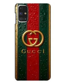 Чехол для Samsung Galaxy M31s с картинкой «Gucci — фирменная полоса и золото» Чехол для Samsung Galaxy M31s с картинкой «Gucci — фирменная полоса и золото»