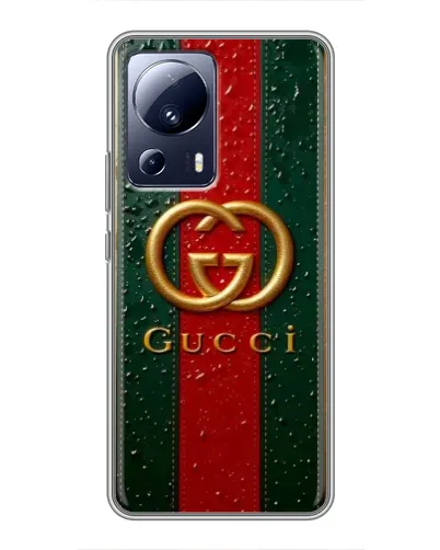Чехол для Xiaomi 13 Lite с картинкой «Gucci — фирменная полоса и золото» Чехол для Xiaomi 13 Lite с картинкой «Gucci — фирменная полоса и золото»