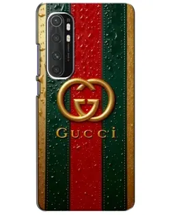 Чехол для Xiaomi Mi Note 10 Lite с картинкой «Gucci — фирменная полоса и золото» Чехол для Xiaomi Mi Note 10 Lite с картинкой «Gucci — фирменная полоса и золото»