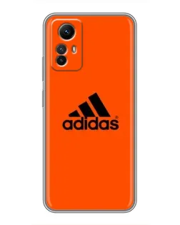 Чехол для Xiaomi Redmi Note 12s с картинкой «Adidas Ukraine» Чехол для Xiaomi Redmi Note 12s с картинкой «Adidas Ukraine»