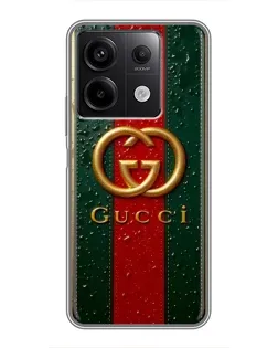 Чехол для Xiaomi Redmi Note 13 (5G) с картинкой «Gucci — фирменная полоса и золото» Чехол для Xiaomi Redmi Note 13 (5G) с картинкой «Gucci — фирменная полоса и золото»